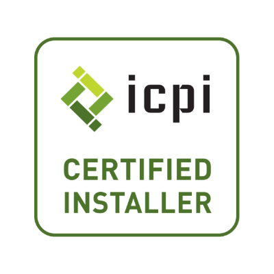 The image features an ICPI Certified Installer logo with a geometric design in green and black text on a white background.