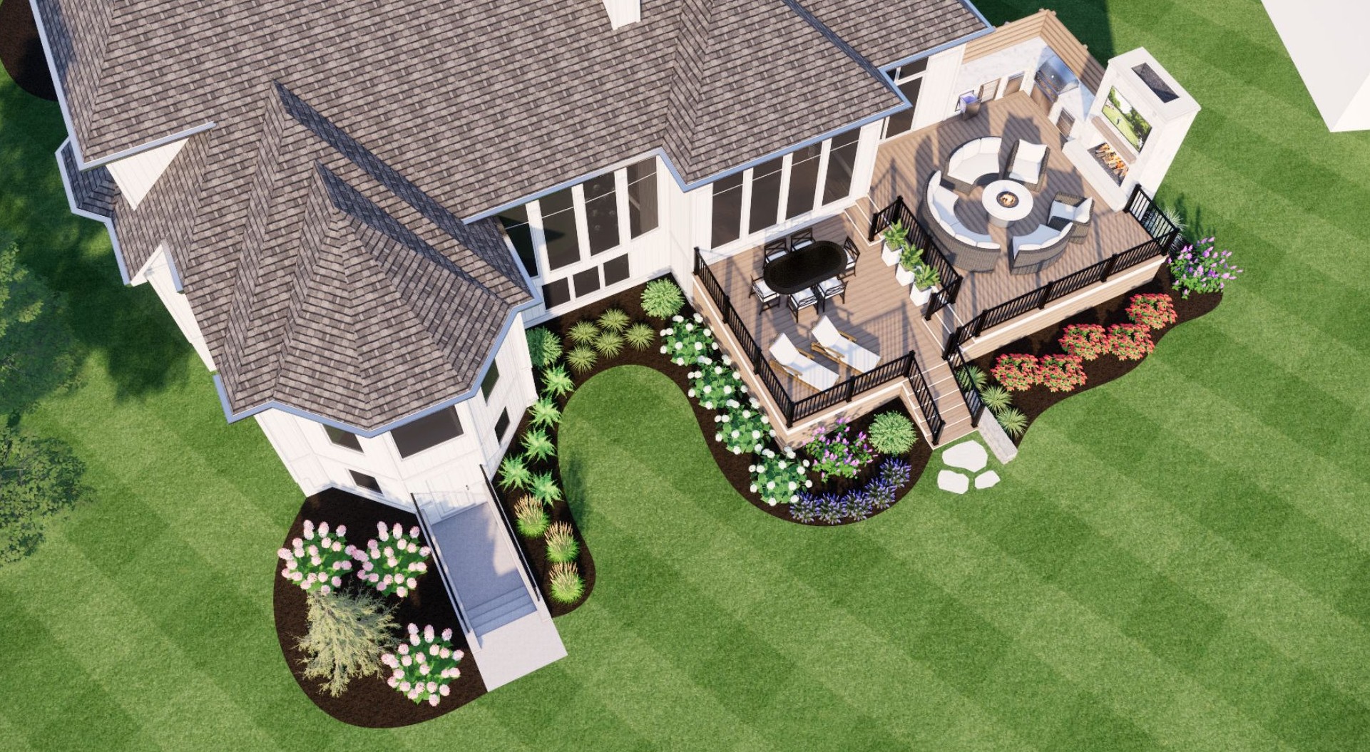 Aerial view of a spacious backyard deck with outdoor seating, grill, and landscaped garden, attached to a modern house.