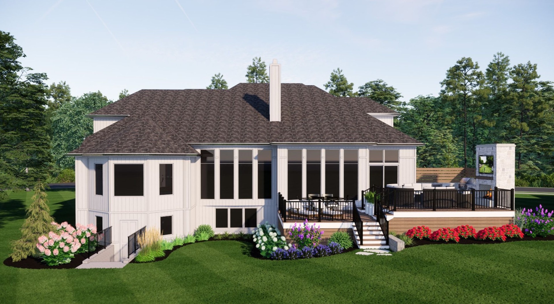 A modern house with large windows, surrounded by lush greenery and colorful flowers, features a spacious outdoor deck and a stone fireplace.